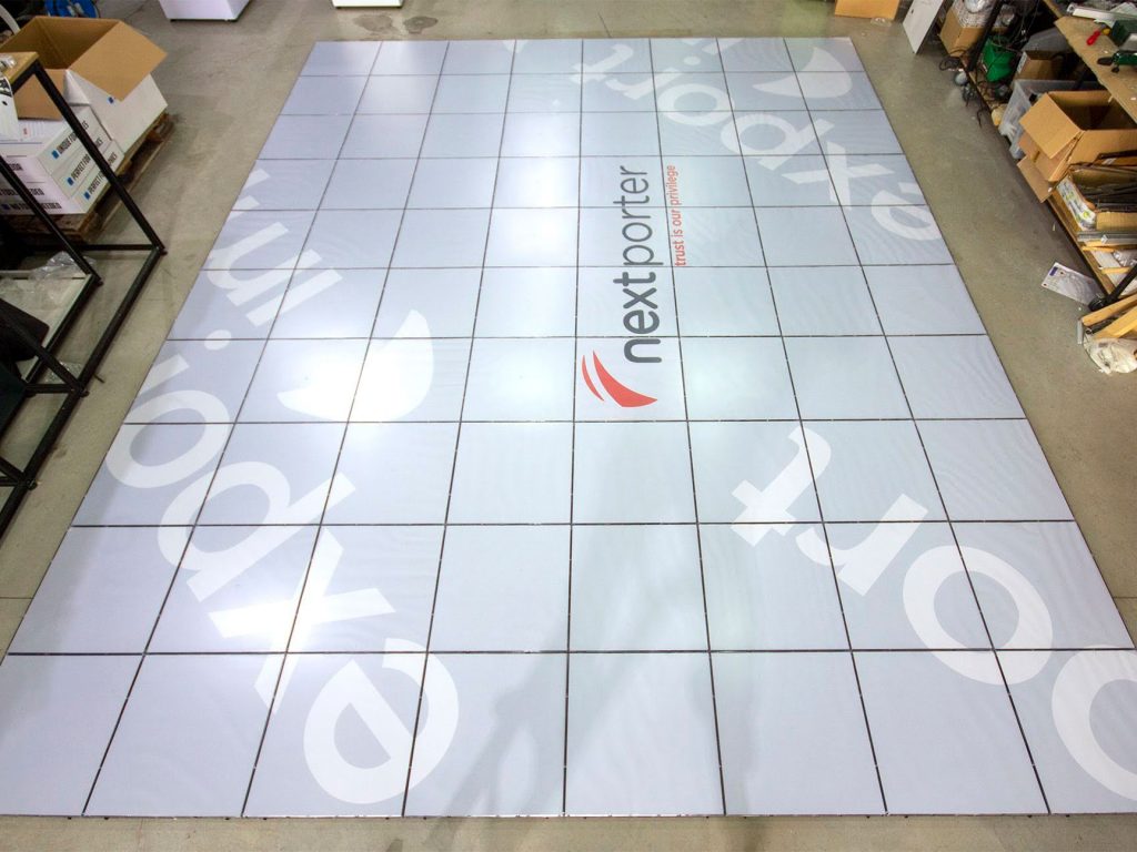 Trade Show Booths Redefined with Stand-On Flooring